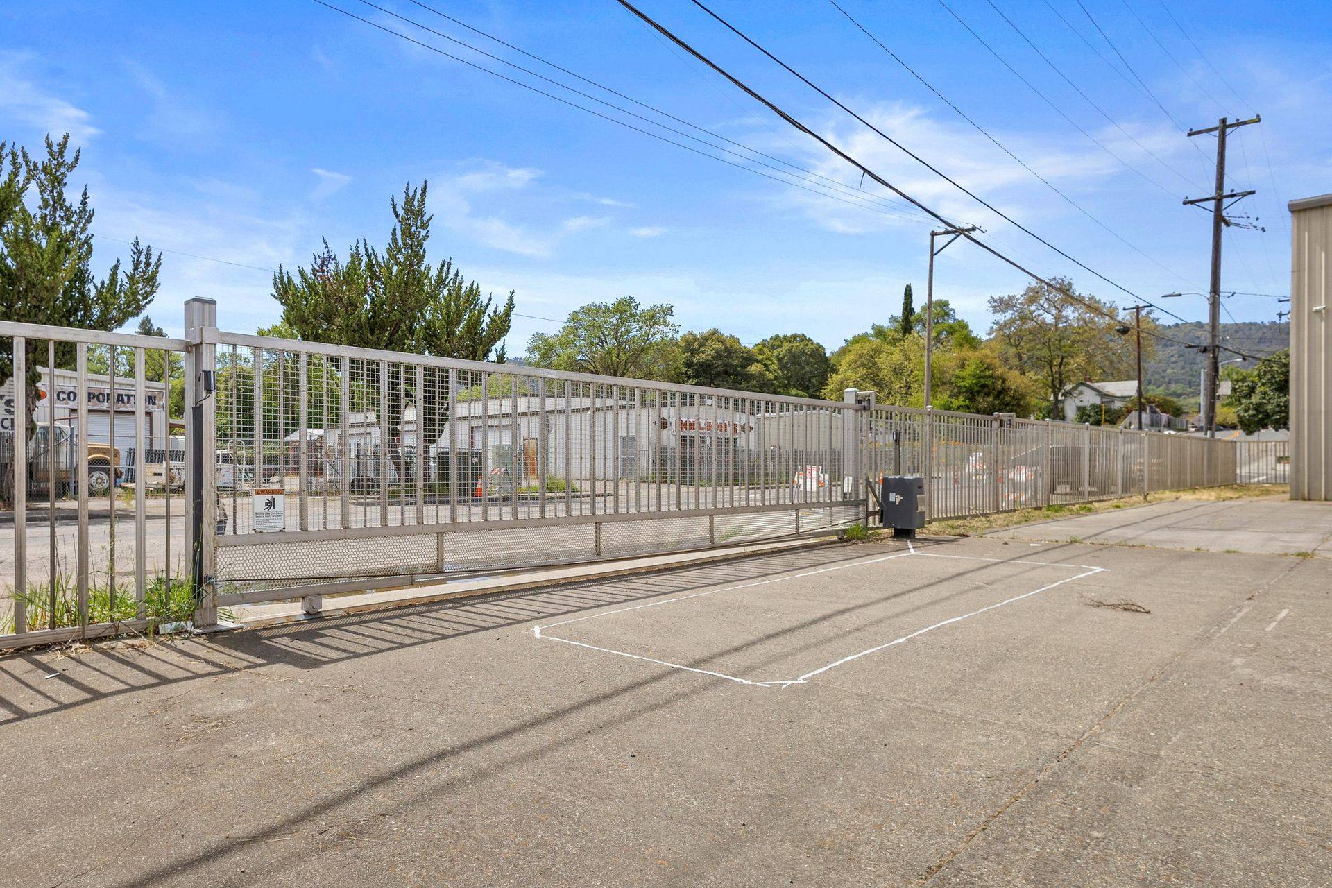 Security gate, paved yard
