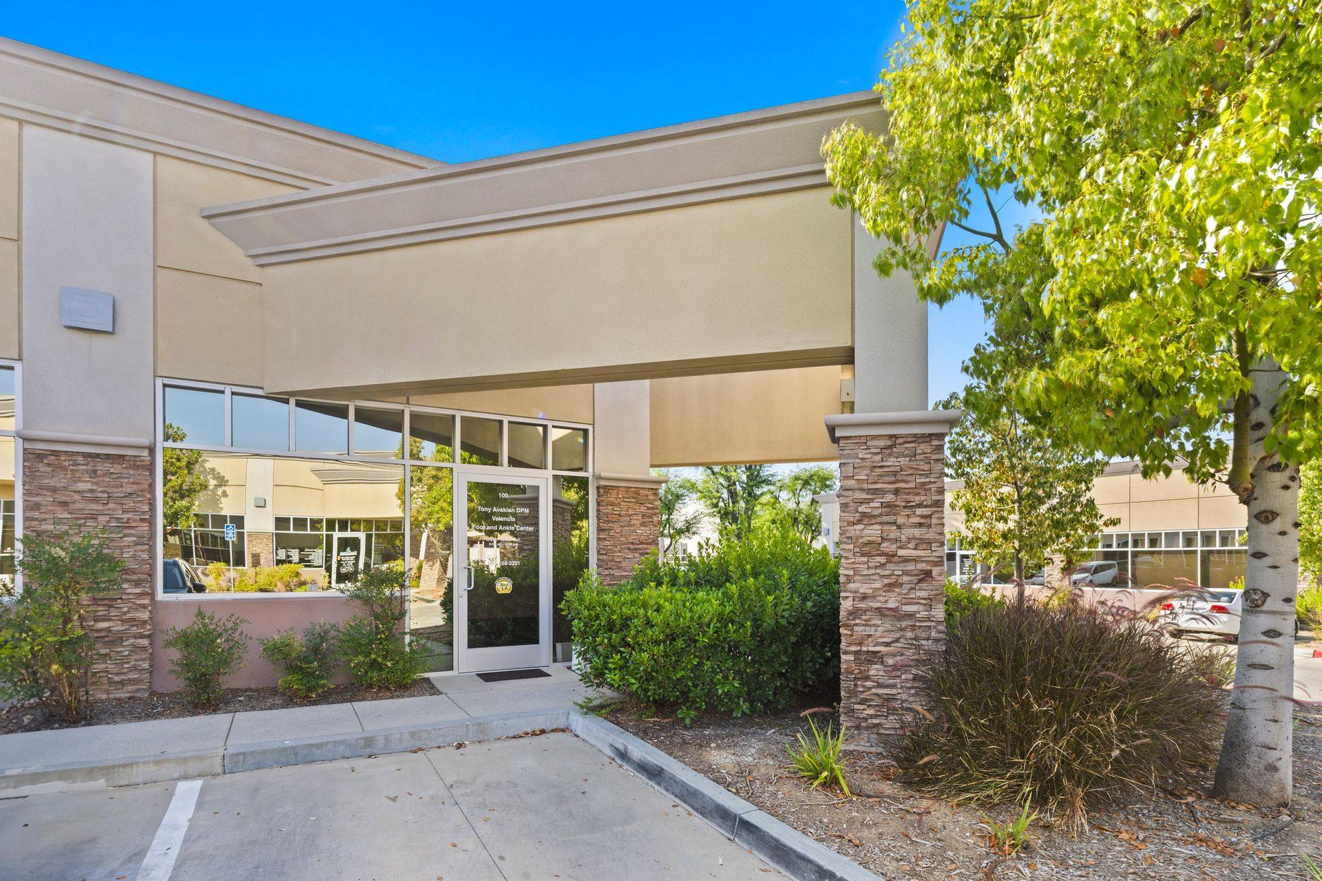 Suite 100 entry portico