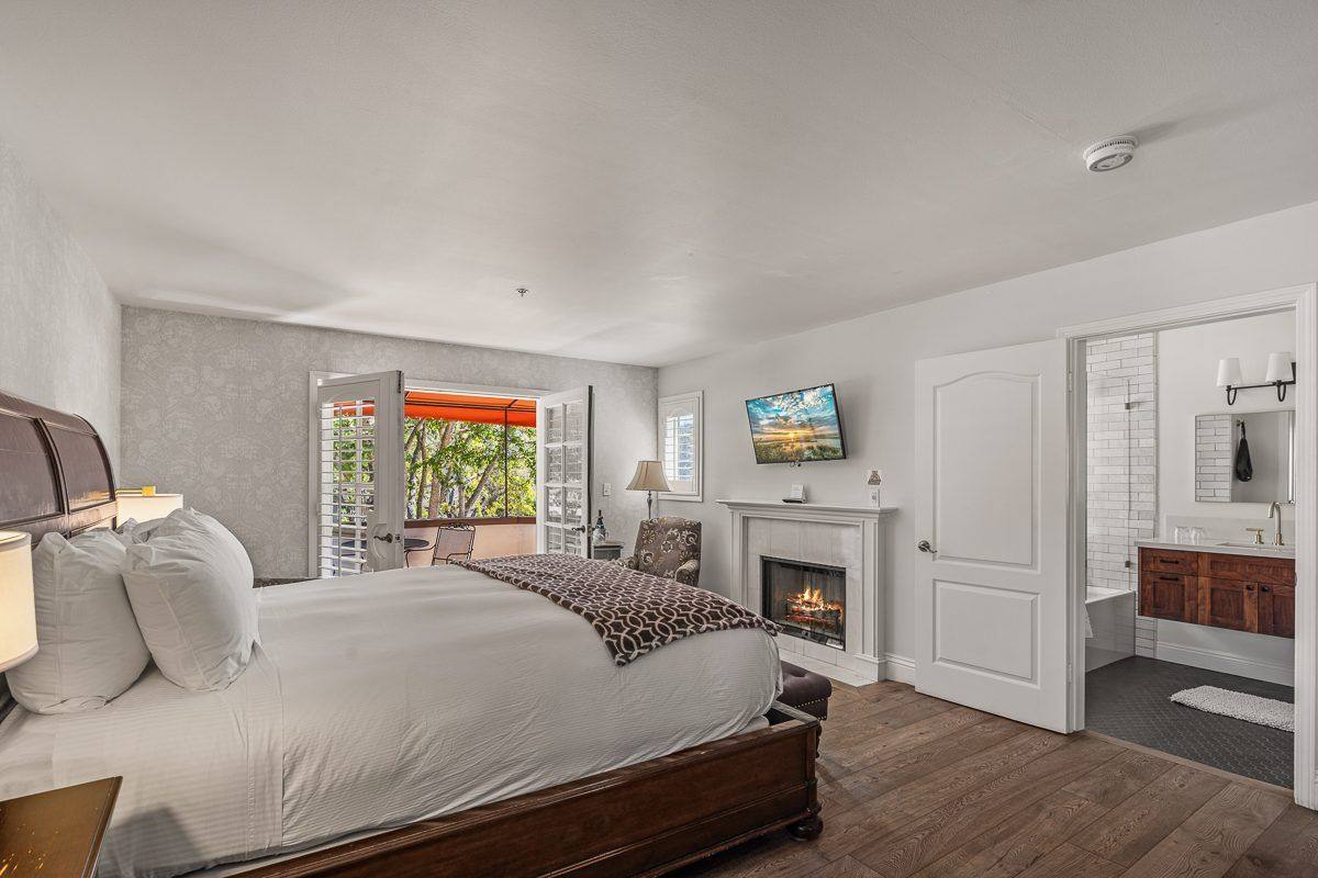 Guest room, fireplace and patio doors