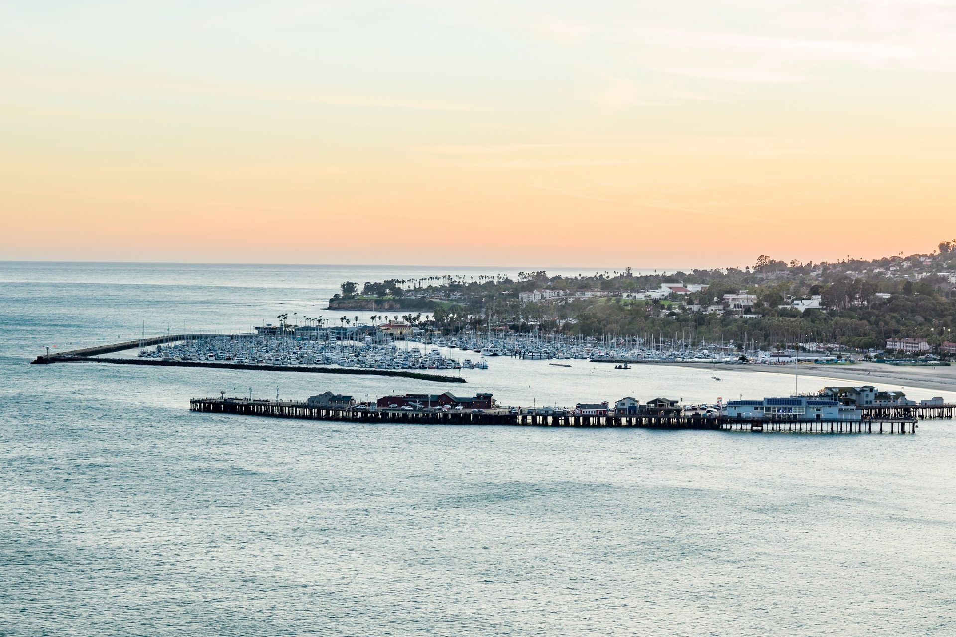 Santa Barbara harbor and wharf at sunset